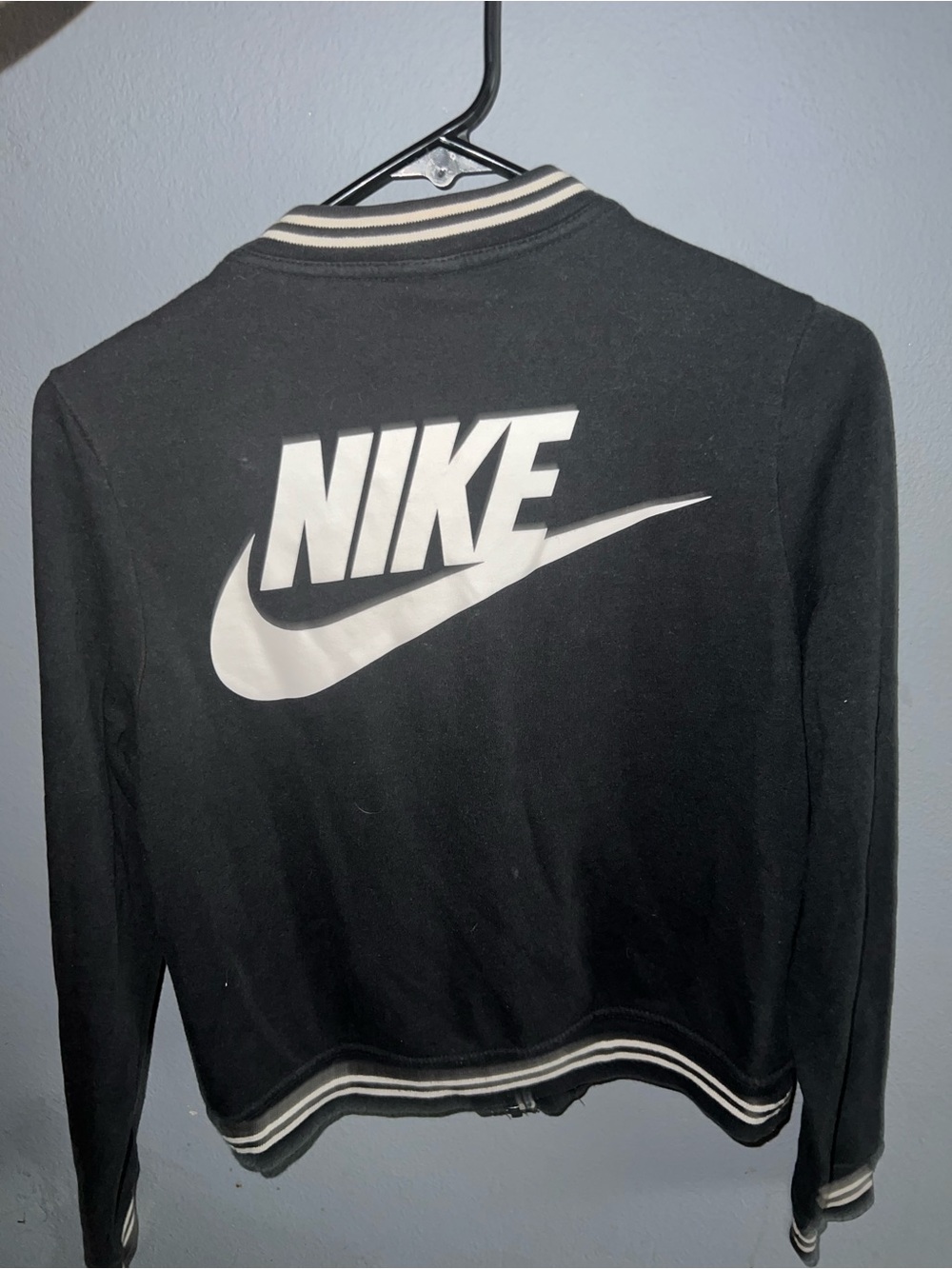 Nike Black Jacket with White Logo and Striped Trim